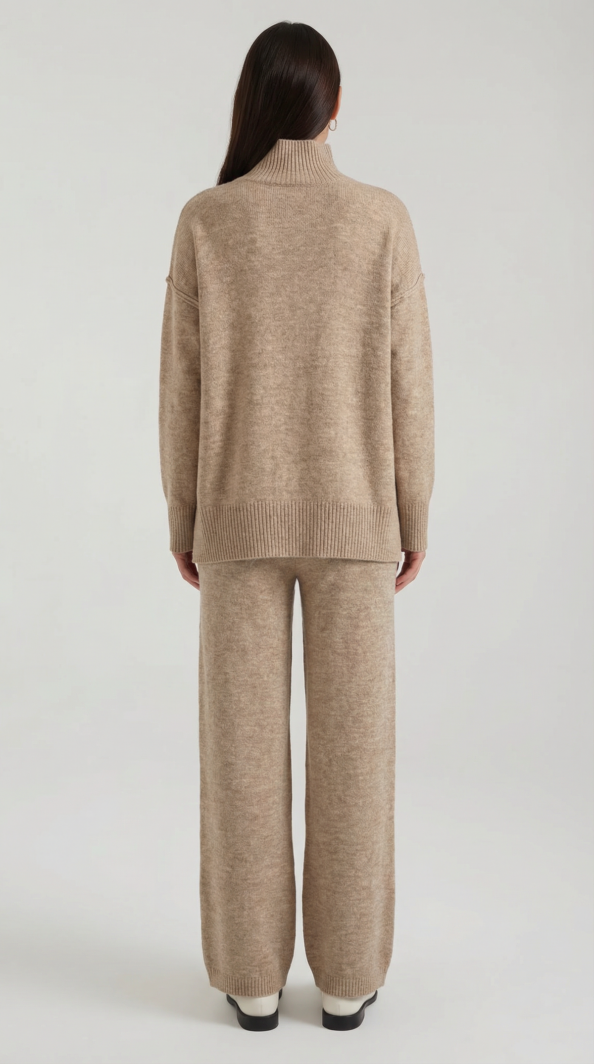 Conjunto de suéter de punto de cuello alto y pantalones vaqueros